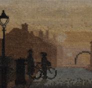 20th Century, needlework embroidery, A figure on a bicycle, framed, mounted, and under glass, 14cm x