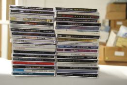 A large box of compact discs 125 approximately - rock , pop and more - a lot of these will be New