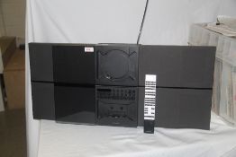 A Bang and Olufsen Beosound Century / cassette and compact disc player with radio - comes with the