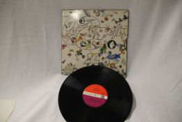 An original red / plum Atlantic label press of Led Zeppelin III- first press in VG+/VG+ 2401002