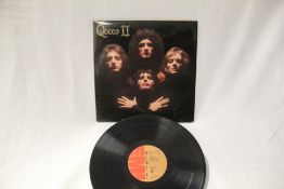 A copy of Queen II on EMI - original press in VG+ / VG+ with some tape wear - residue on inner bag