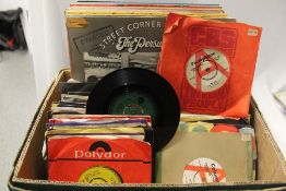A mixed box of albums with some 7' singles - demos included - condition varies which is why we