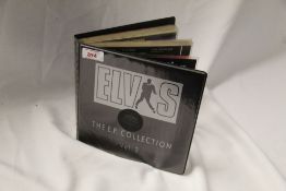 A wallet with 11 Elvis unplayed which are likely unplayed - volume 2
