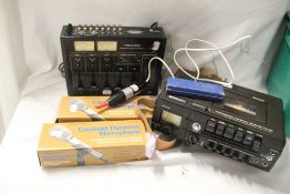 A Realistic mixer , Superscope cassette player and Mics - as in photot