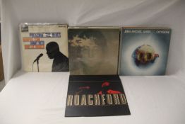 A lot of 25 various albums - as in photos - rock . Pop and more on offer here - ideal for online