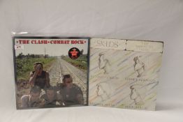 A lot of two albums by the Skids and the Clash ( no poster )
