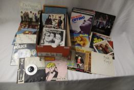 A lot of 45's - rock , pop , new wave and more - all generally ex shape - 70 in total
