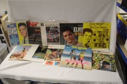 A lot of Cliff and Elvis records and in photos