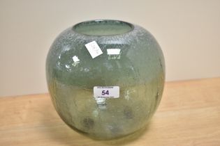 A 20th Century green art glass vase, with mottled and cracked design, measuring 20cm tall