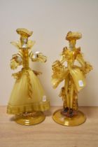 A pair of vintage amber Murano glass figurines by Franco Toffolo.