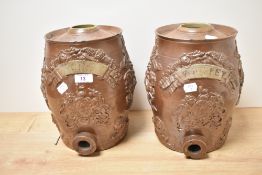 Two Victorian glazed stoneware spirit barrels, named gin and whiskey, having relief Royal cipher