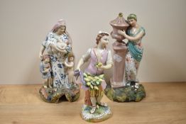 Two Staffordshire pottery figures depicting mother with children, the other a lady with