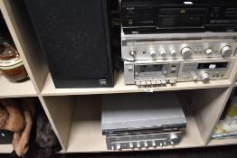 An Aiwa CD deck, A panasonic DVD players, a Yamaha stereo receiver, a Hitachi stereo receiver and