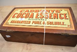 A vintage stained wood confectionary box, 'Cadbury's Cocoa Essence', measuring 10cm x 10cm x 38cm