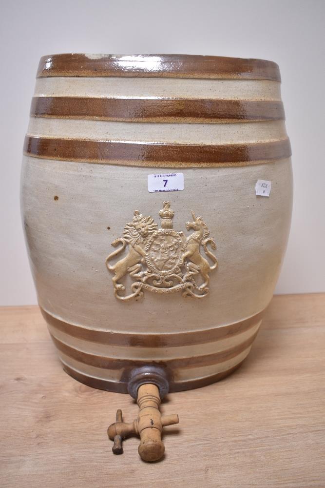 A Victorian Doulton and Watts glazed stoneware spirit barrel, having Royal cipher with lion and