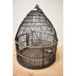 A 19th century wire work bird cage.
