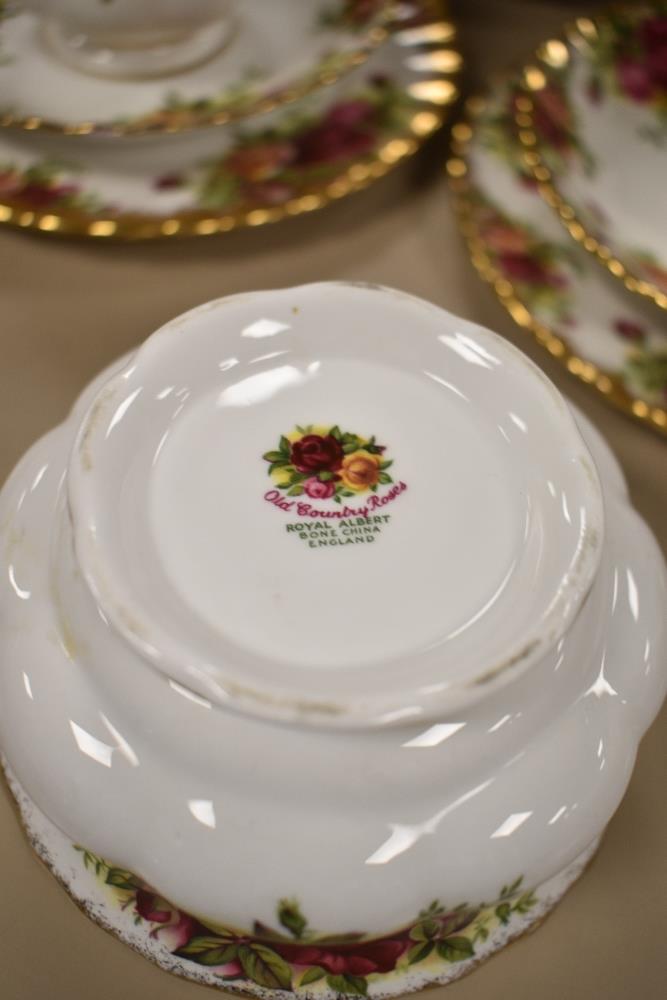 A selection of Royal Albert 'Old Country Roses' tea wares, comprising; cake plate, two cups and - Image 2 of 2