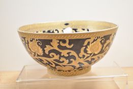 A Chinese porcelain blue and gilt tapestry, footed bowl, 26cm diameter