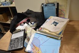 A selection of flight simulator/ acrobatic books, maps, bag and similar.