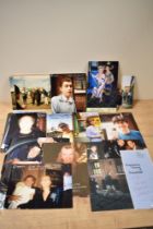 A collection of autographed photographs and ephemera, including Joe Pasquale, Roy Chubby Brown,