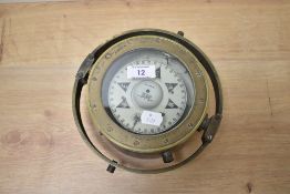 A vintage brass gimbal compass, 'Sestrel Dead-Beat, Henry Browne & Co Ltd'.