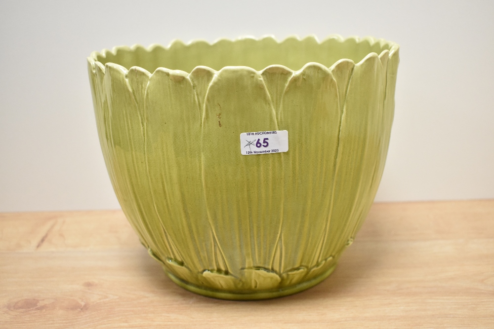 A Burmantofts Faience vintage green planter of foliate form.