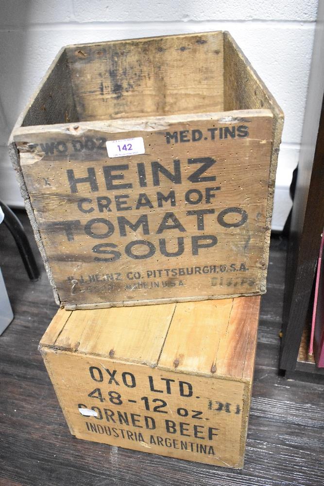 Two vintage wooden advertising crates, one for Heinz cream of tomato soup and the other OXO ltd