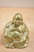 A vintage cast brass Hotei Buddha figure.