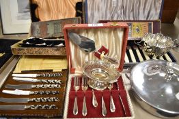 A collection of vintage flat ware, including boxed bone handled butter knives, early plastic handled