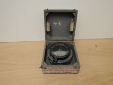 An Air Ministry marked Type P8 Compass and original wooden carry case marked P11, compass marked