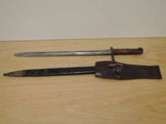 A German/Belgian Mauser Export Bayonet with leather scabbard, blade marked PV3155, blade length