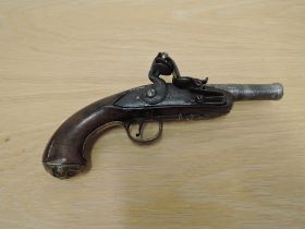 A small Flintlock Pistol with cannon barrel, decorated grip, lock plate & trigger guard, brass