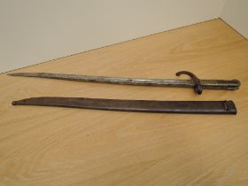 A French Chassepot Bayonet with scabbard, guard numbered 6864 scabbard numbered T70363, blade length