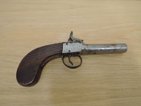 A small Pocket Percussion Pistol with turn off barrel, missing percussion nipple, proof mark on