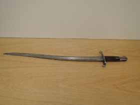 A British 1856 pattern Sword Bayonet, no scabbard, marks on blade and hilt, blade length 58cm,