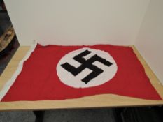 A German WWII Third Reich NSDAP Flag, marked NSDAP 1941, Berlin 55 x 100, Swastika and Eagle, Size