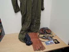 A RAF Aircrew Overall MKII dated 1971 along with two leather gloves size 9 & size 10 dated 1943, a