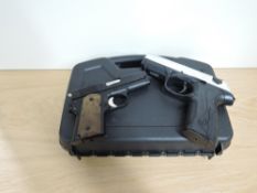 A plastic case with two Air Pistols, PX4 Storm PX16851, gas powered, no calibre stated and Automatic