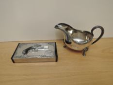 A Silver plated Sauce Boat marked Elkington, engraved 2nd Warwikshire along with a chrome Cigar