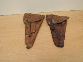 Two WW2 Swedish Leather Pistol Holsters both with accessories, one good, one worn, both possibly for