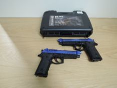 A pair of modern Air Soft Guns, no makers marks seen, in hard plastic case. Purchaser must be over