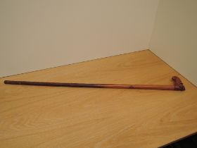 A Victorian Sword Stick having carved figural handle (af), blade length 25cm, overall length 88cm