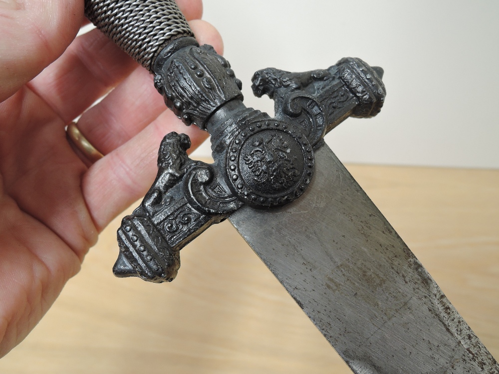 A Dagger, possibly Spanish, metal crossguard decorated with lion, crown pommel, broad blade, no - Image 3 of 3