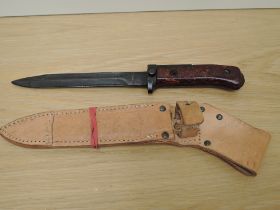 A 1950's Czechoslovakia VZ58 Bayonet with leather scabbard, blade length 16.5cm, overall length 17.