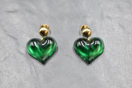 A pair of Lalique green glass heart shaped earrings with yellow metal fittings, bearing signature en