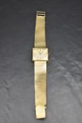 A ladies yellow metal Longines wristwatch, marked 14k and 14kt Gold, the square case enclosing the