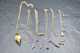 A small selection of yellow metal jewellery,including two pairs of earrings, broken chains etc,