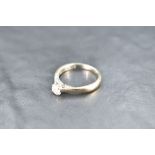 A diamond solitaire ring having diamond set mount, total approx 0.45ct in a 4 claw setting on an