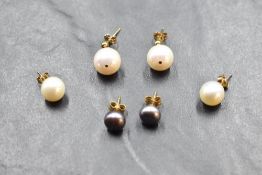 Three pairs of pearl stud earrings all having 9ct gold fittings