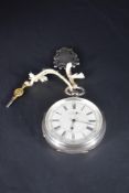 An Edwardian silver over sized key wound chronograph pocket watch by Harris Deutch, Manchester no:
